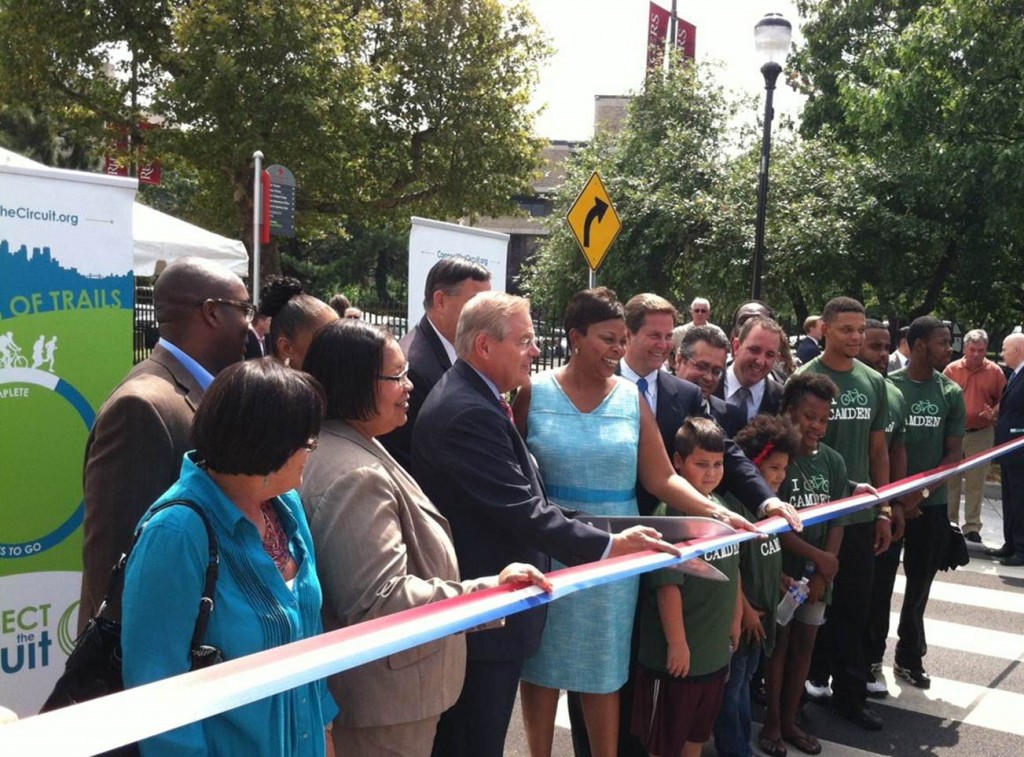 Senator Menendez, Camden Mayor Redd, State Senator Donald Norcross and local leaders and community members officially open the Camden TIGER projects. 